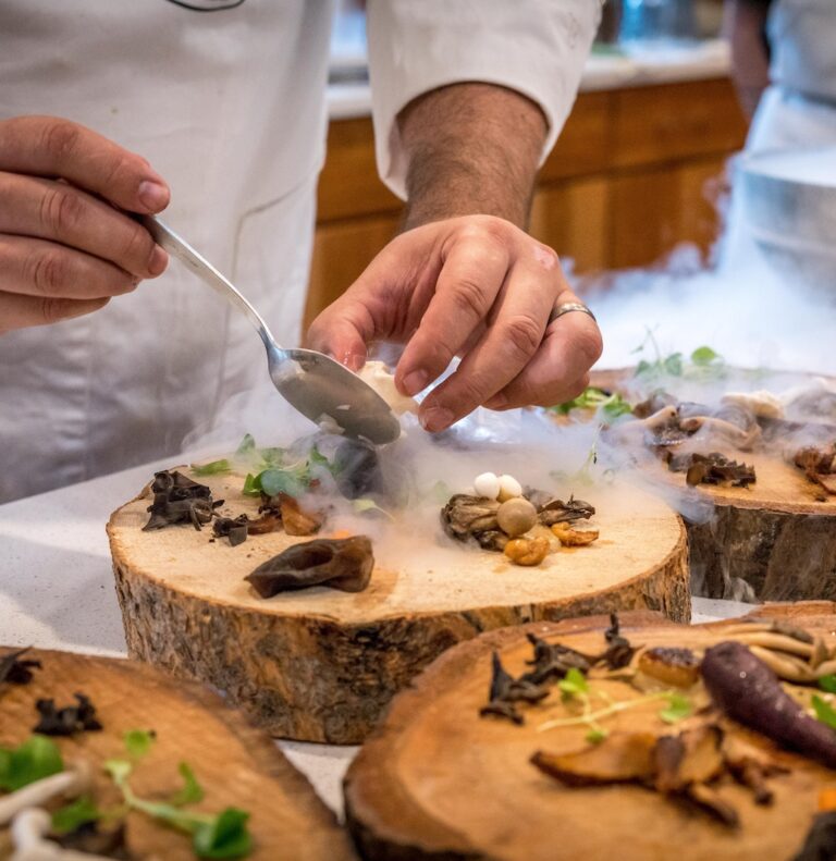 Chef Preparing Vegetable Dish on Tree Slab